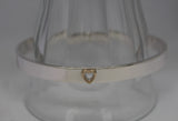 7mm wide oval bangle with 9ct gold heart