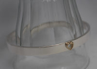 7mm wide oval bangle with 9ct gold heart